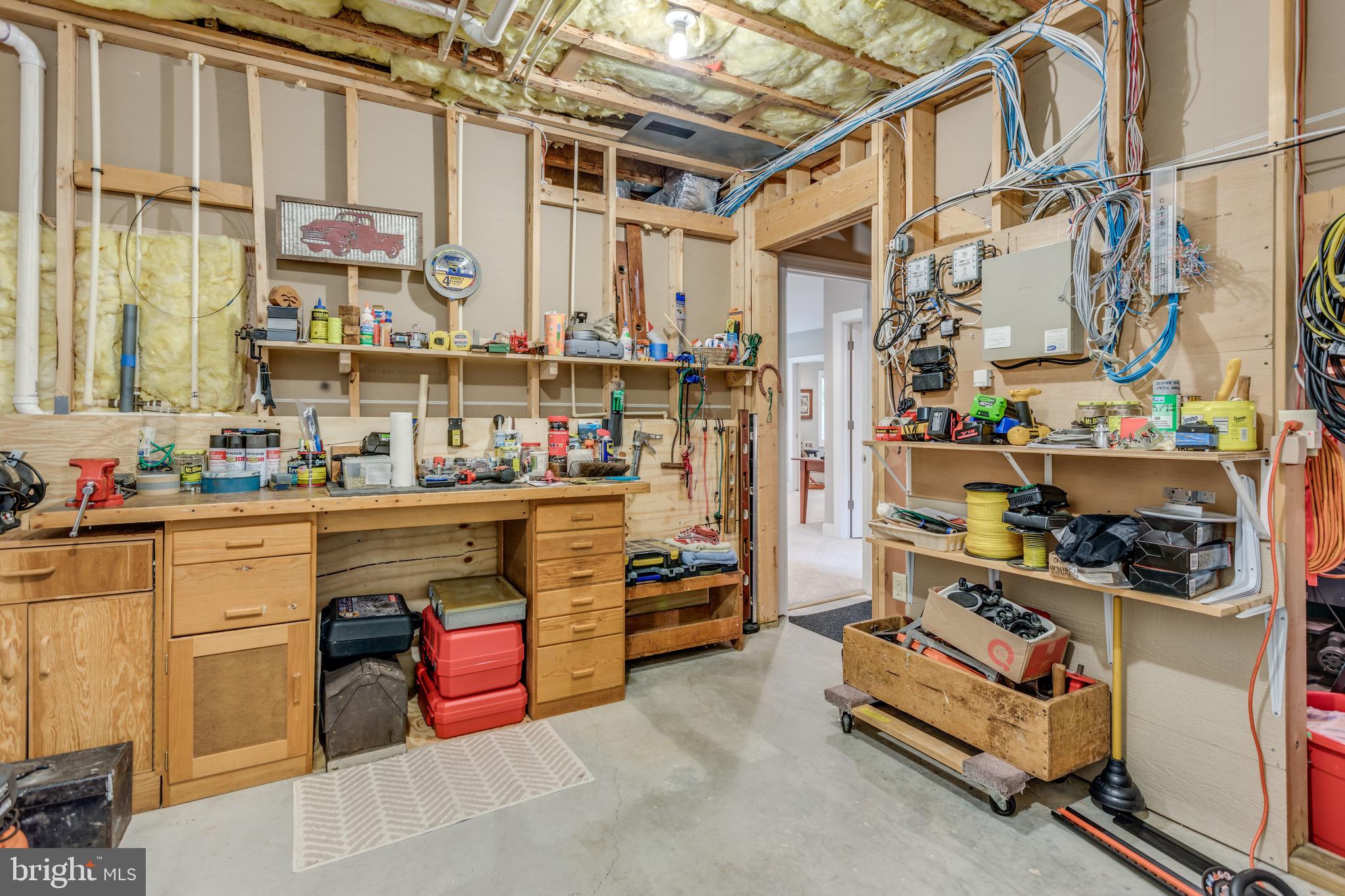 564 Montevideo Road Berkeley Springs, WV 25411 - Photo 45 of 71 Lower Level Workshop/Storage Room