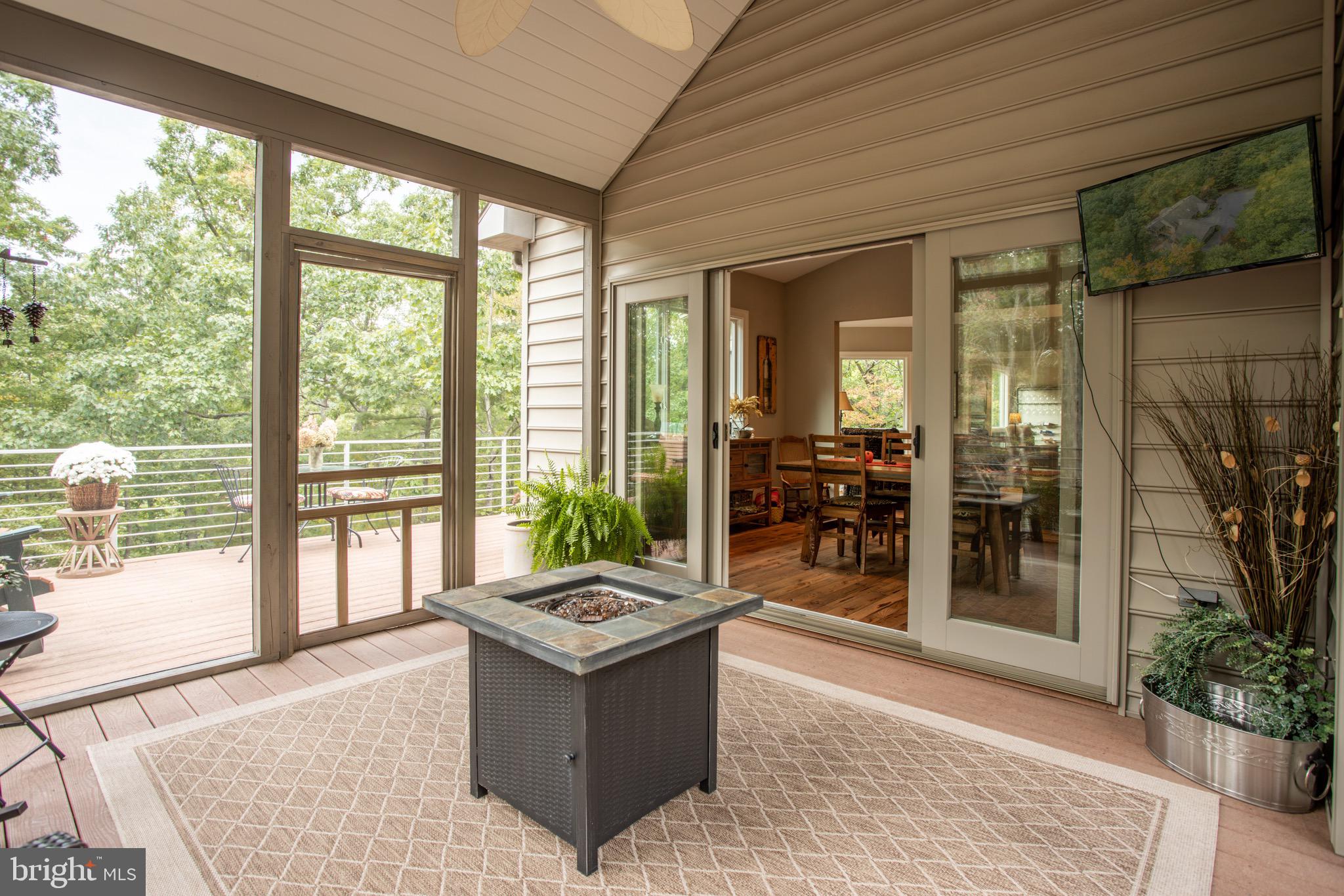 564 Montevideo Road Berkeley Springs, WV 25411 - Photo 49 of 71 Screened in Porch