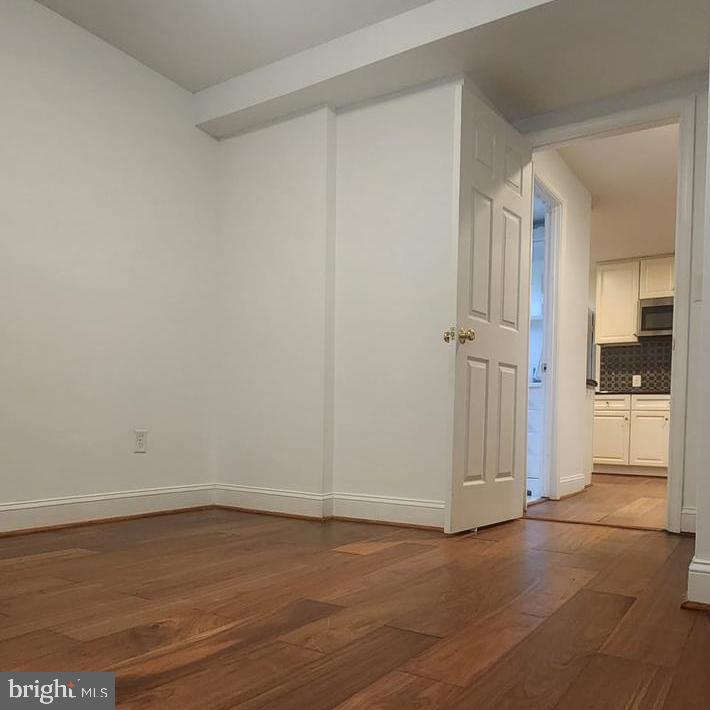 1134 12th Street Laurel, MD 20707 - Photo 4 of 13 a view of empty room with wooden floor