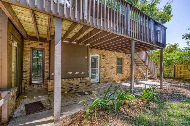 a backyard of a house with a garden