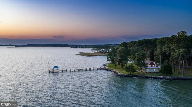 a kitchen with granite countertop stainless steel appliances and wooden cabinets