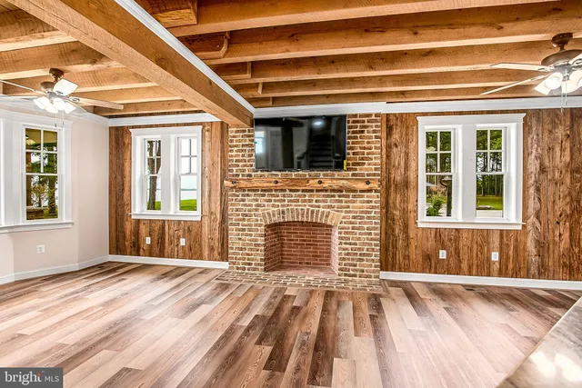 a view of an empty room with a flat screen tv