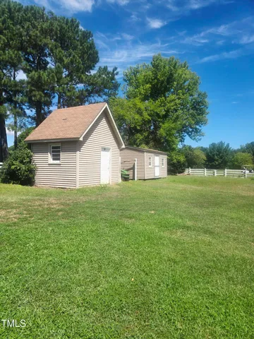 a house view with a garden space