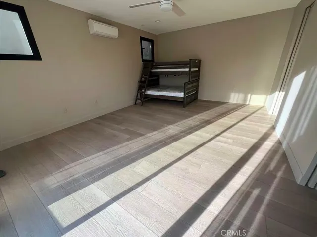 a view of an empty room with a fireplace