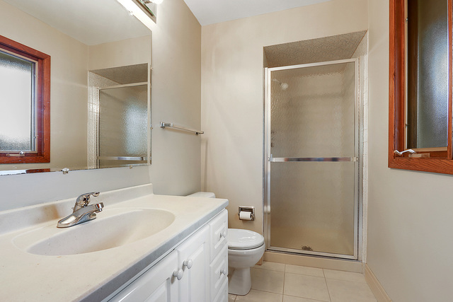 13000 Winnebago Road Palos Heights, IL 60463 - Photo 11 of 15 a bathroom with a sink toilet and vanity