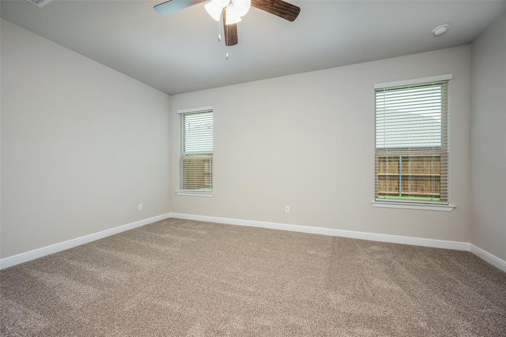 5231 Meadow Lane Krum, TX 76249 - Photo 9 of 17 Carpeted room with neutral wall tones