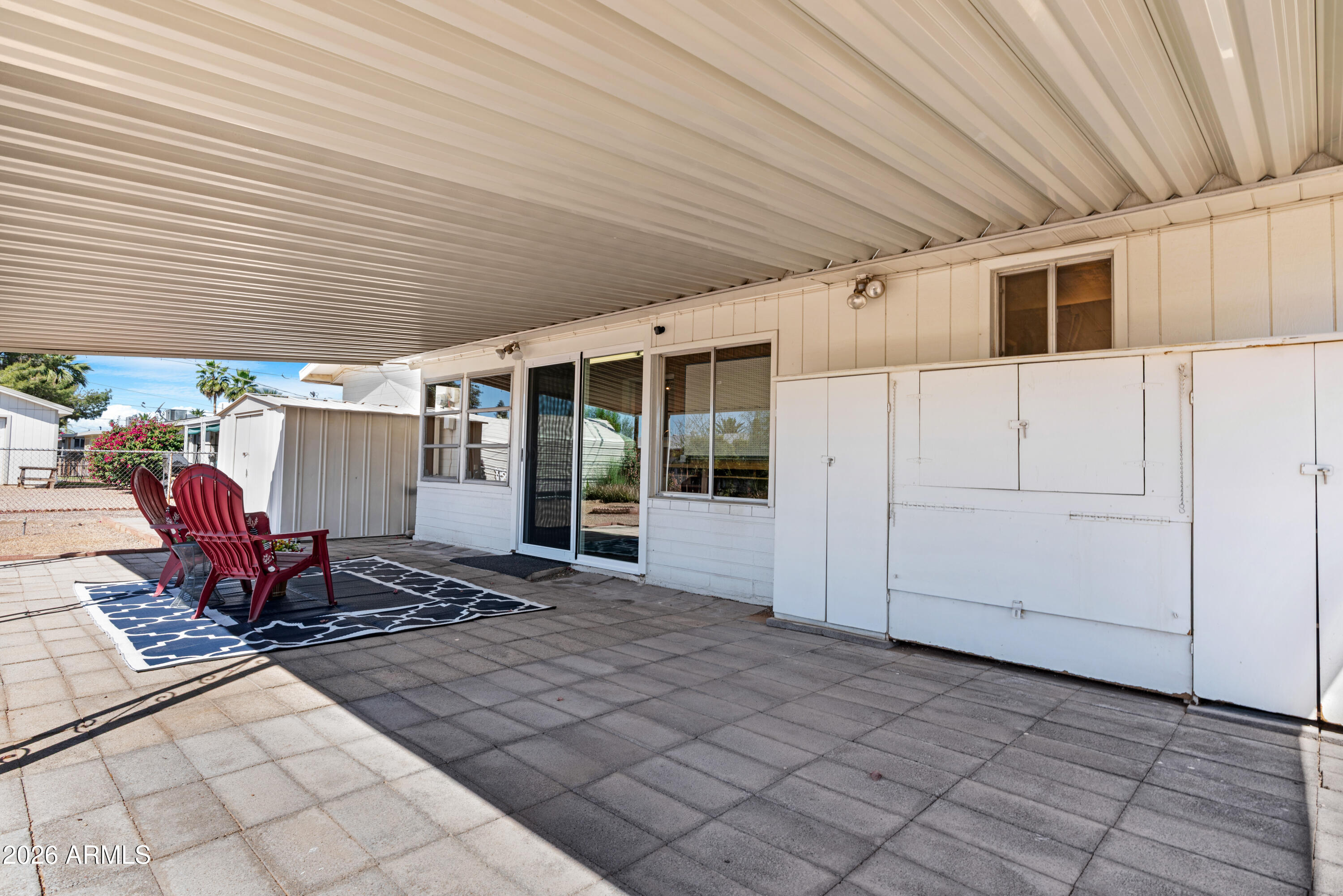 5437 East Butte Street Mesa, AZ 85205 - Photo 39 of 56 a backyard of a house with seating space