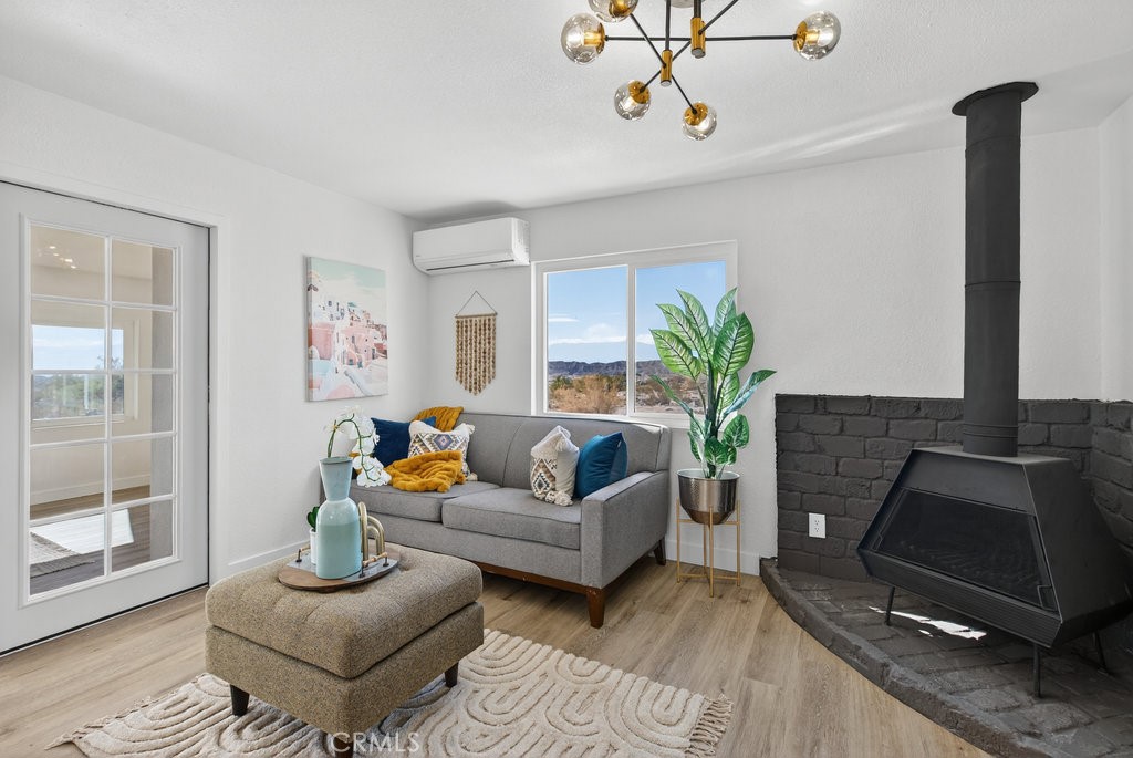 22700 Tamyran Road Desert Hot Springs, CA 92241 - Photo 17 of 65 a living room with furniture