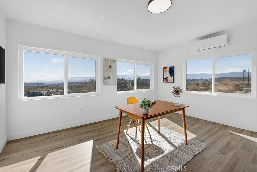 22700 Tamyran Road Desert Hot Springs, CA 92241 - Photo 20 of 65 a workspace with furniture and window