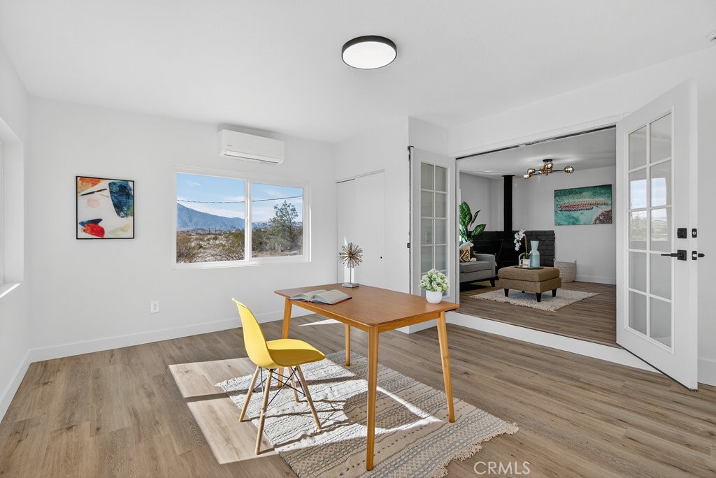 22700 Tamyran Road Desert Hot Springs, CA 92241 - Photo 26 of 65 a living room with furniture and a table