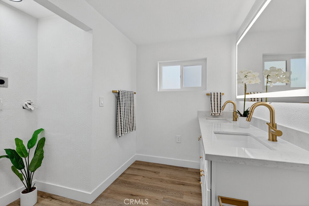 22700 Tamyran Road Desert Hot Springs, CA 92241 - Photo 31 of 65 a bathroom with a sink and a mirror