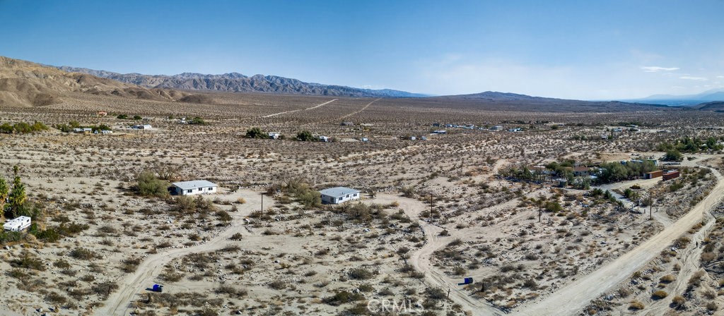 22700 Tamyran Road Desert Hot Springs, CA 92241 - Photo 43 of 65 a view of a large mountain with mountains in the background