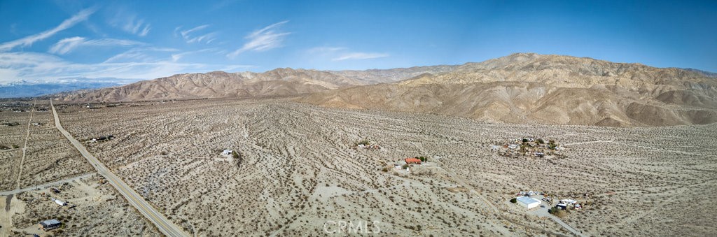 22700 Tamyran Road Desert Hot Springs, CA 92241 - Photo 61 of 65 a view of a dry yard covered with snow