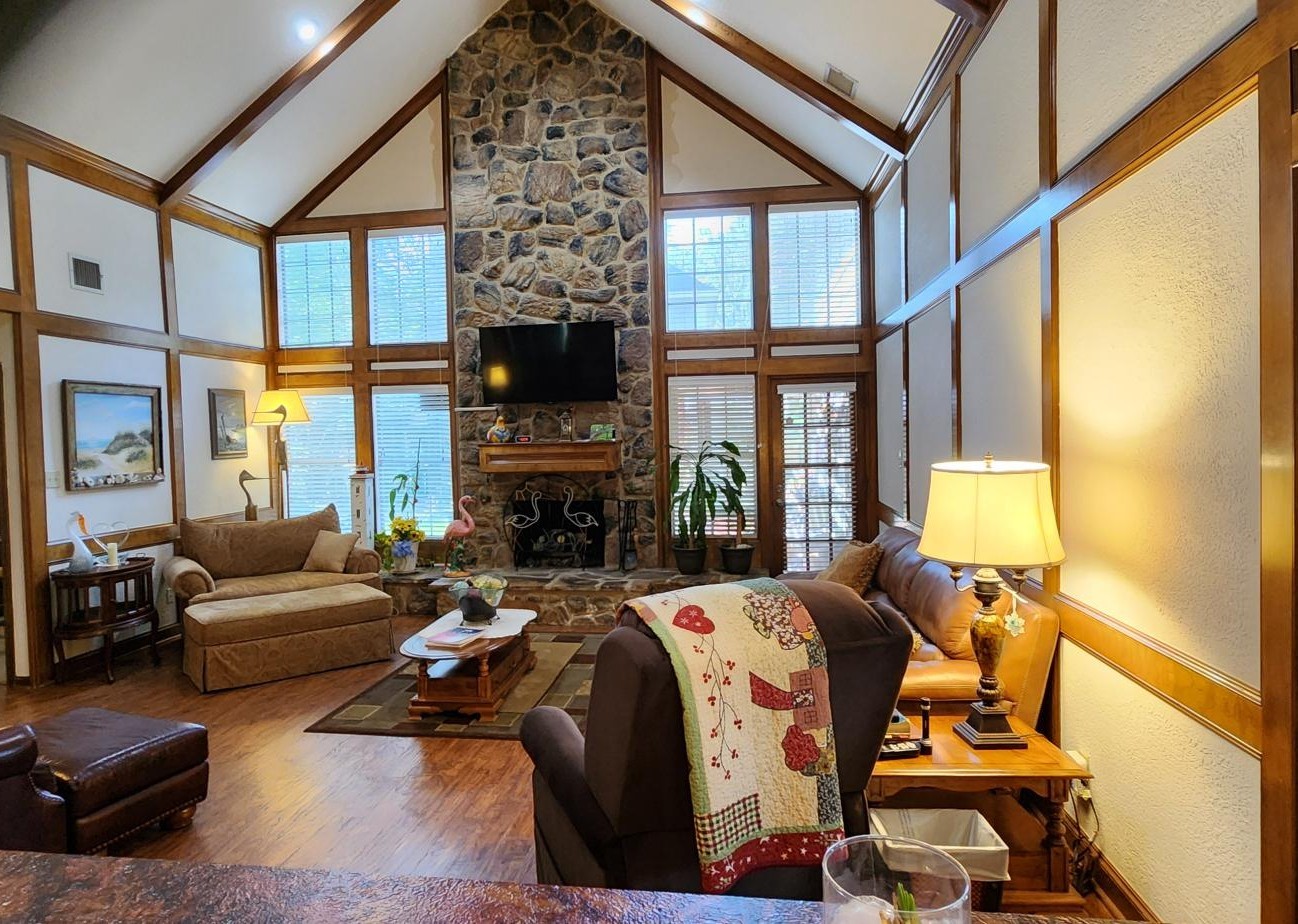 16155 Hexham Drive Spring, TX 77379 - Photo 10 of 47 a living room with fireplace furniture and a flat screen tv