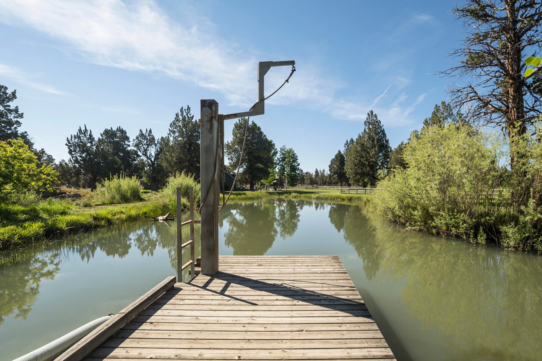 24055 Dodds Road Bend, OR 97701 - Photo 56 of 61 Pond with Dock
