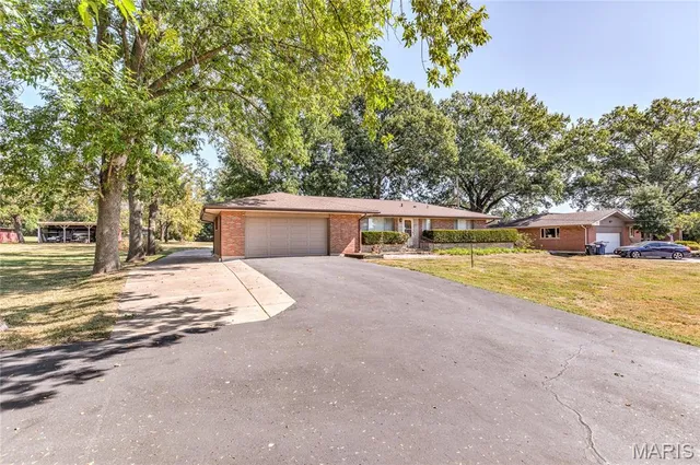 $425,000 | 2395 Charbonier Road, Florissant, MO 63031