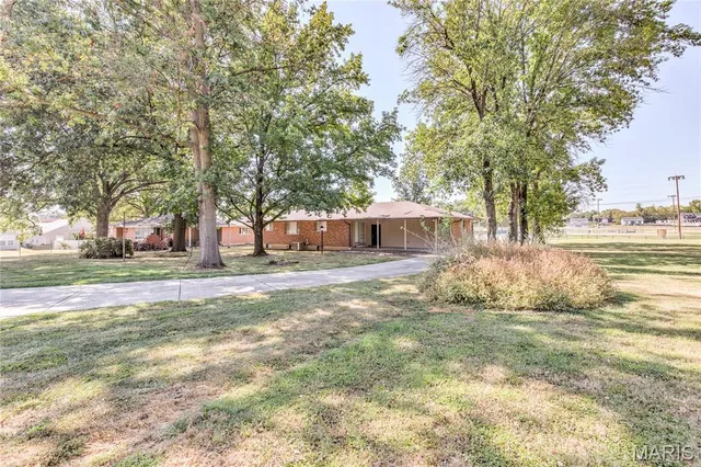 $425,000 | 2395 Charbonier Road, Florissant, MO 63031