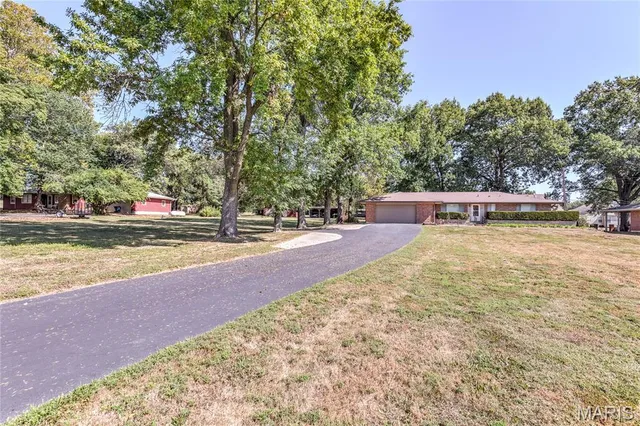 $425,000 | 2395 Charbonier Road, Florissant, MO 63031