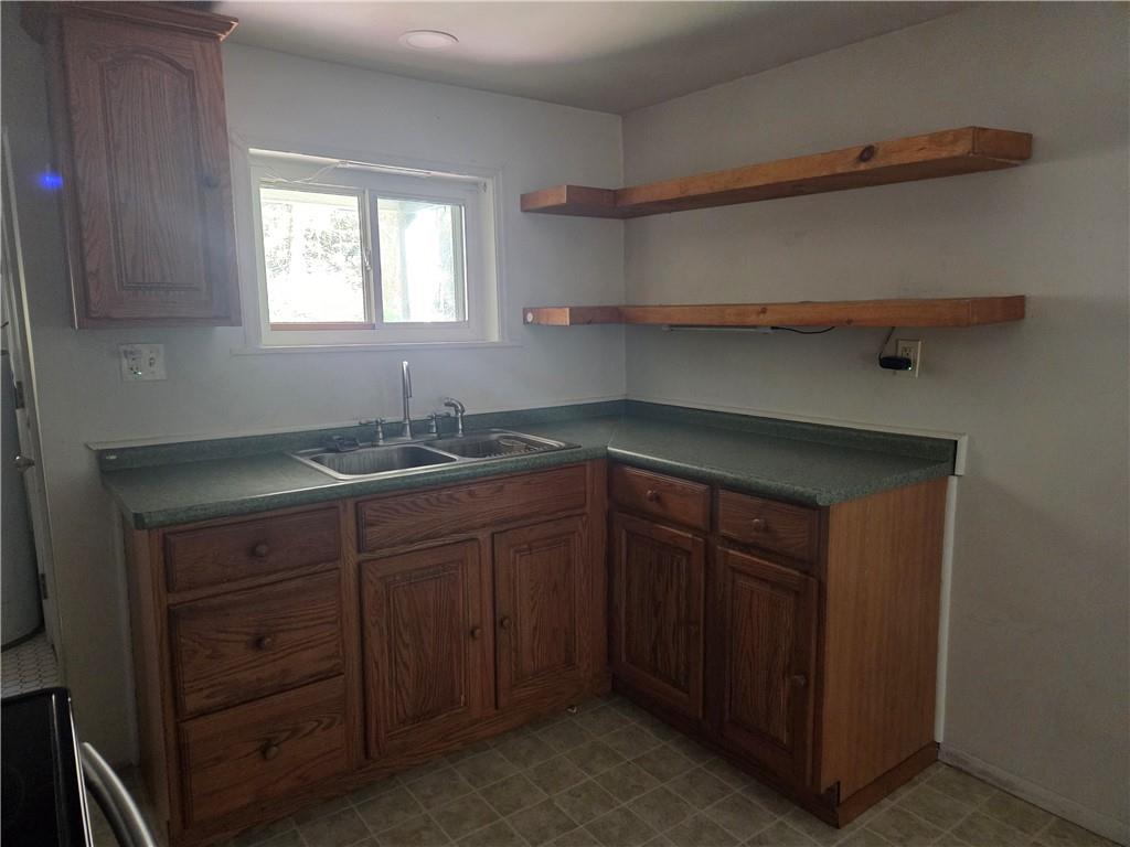 258 Spring Run Road Crescent, PA 15046 - Photo 27 of 48 a kitchen with a sink and cabinets