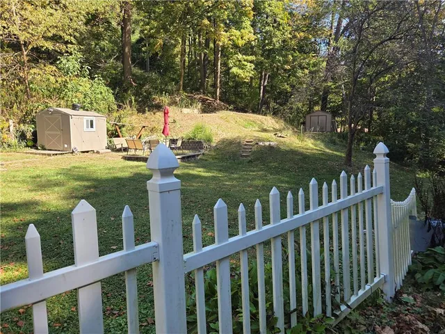 a view of a wooden deck and yard