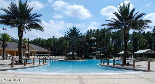 a view of a house with a park