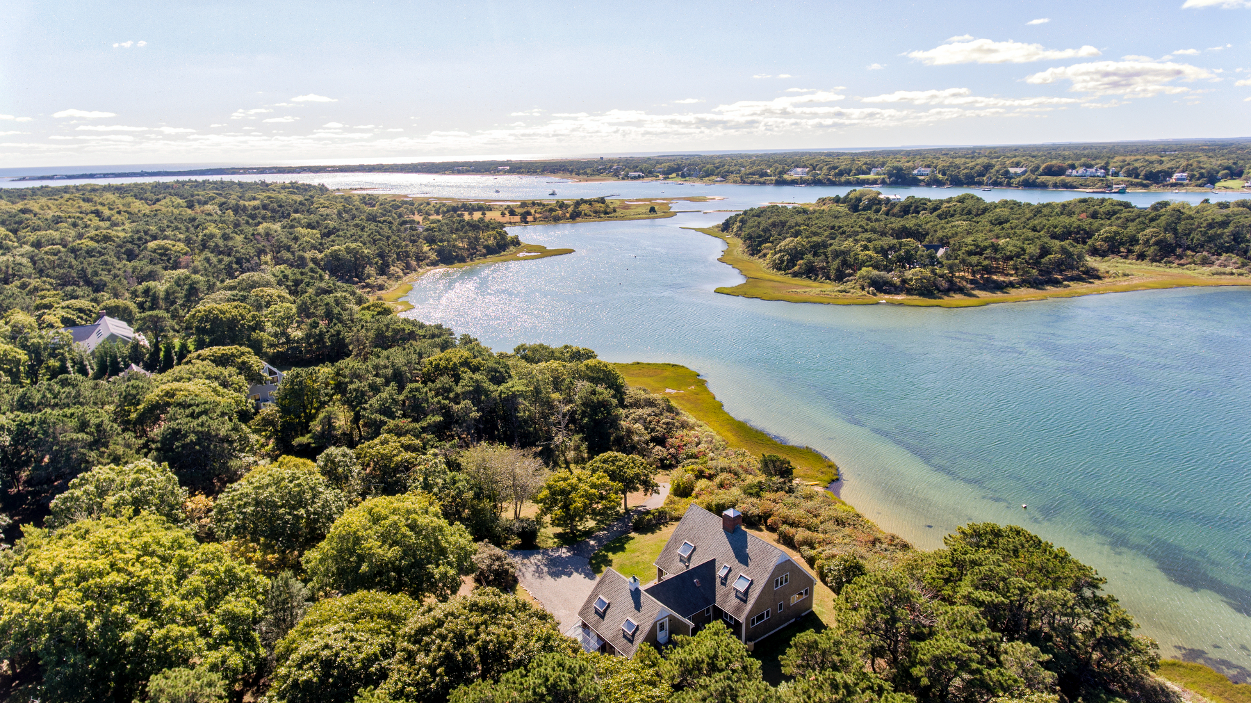 24 Litchfield Road Edgartown, MA 02539 - Photo 1 of 18 a view of a sky from a terrace