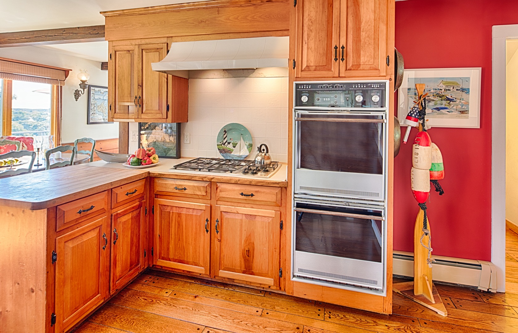 24 Litchfield Road Edgartown, MA 02539 - Photo 12 of 18 a kitchen with stainless steel appliances granite countertop a stove and a sink