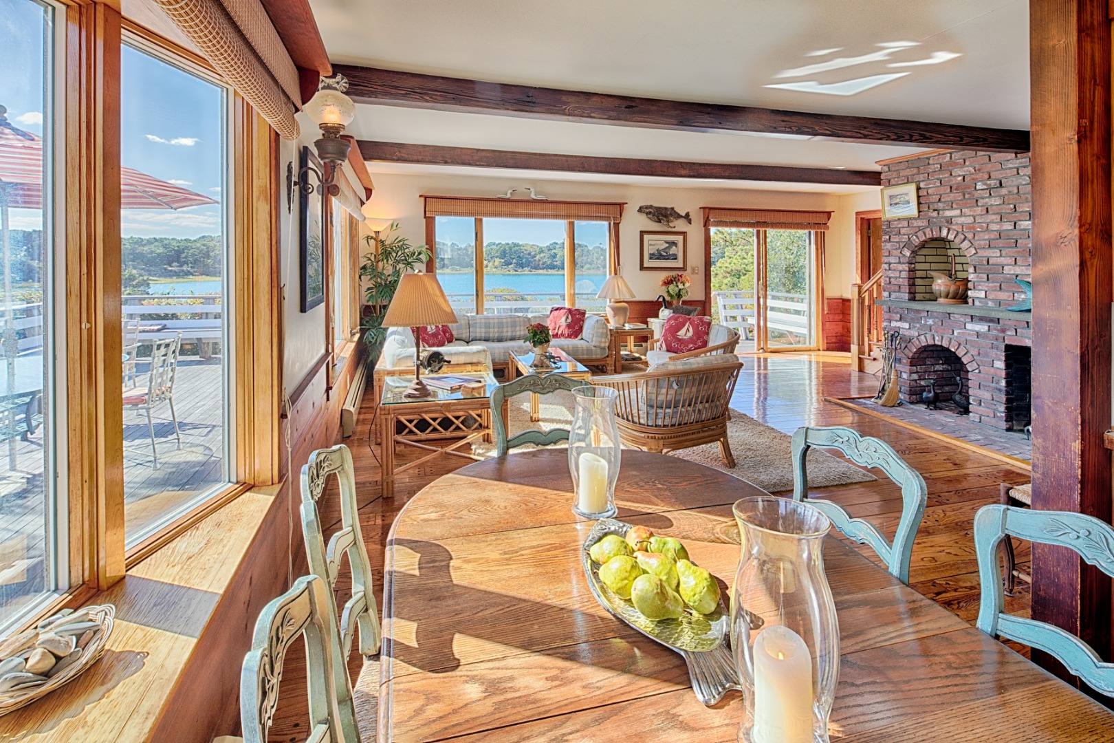 24 Litchfield Road Edgartown, MA 02539 - Photo 9 of 18 a view of a dining room with furniture a chandelier and wooden floor
