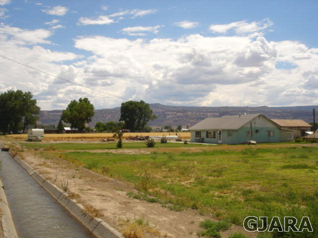 1049-19 19 1/2 Road Fruita, CO 81521 - Photo 6 of 9 a view of an ocean beach
