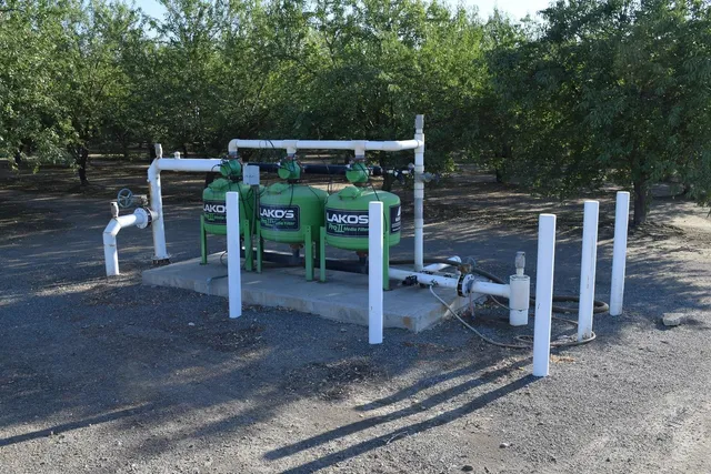 a view of a chairs and table in the patio