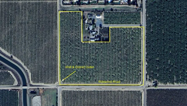 a view of a door and brick wall