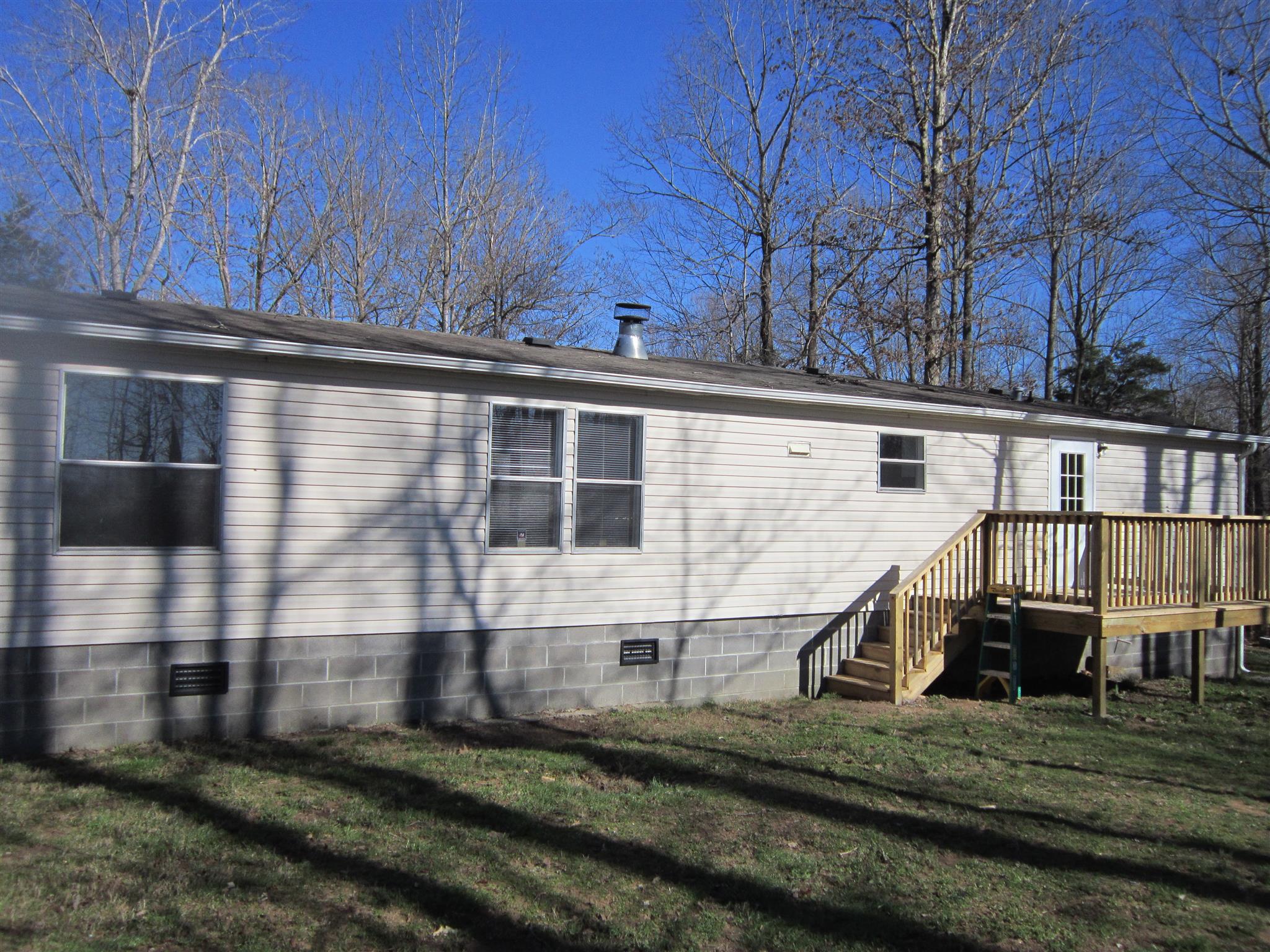 7919 East Plunders Creek Road Dickson, TN 37055 - Photo 2 of 21 back view of home with large deck