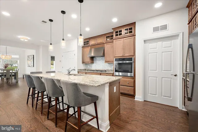 a bedroom with a bed and a ceiling fan