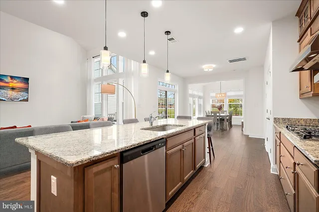 a bathroom with a double vanity sink and shower