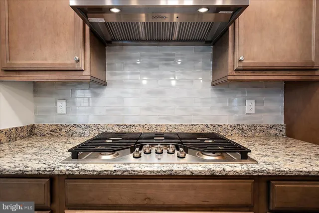 a bedroom with a bed and a night lamp