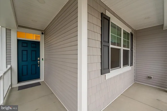 a kitchen with stainless steel appliances granite countertop a stove and a microwave