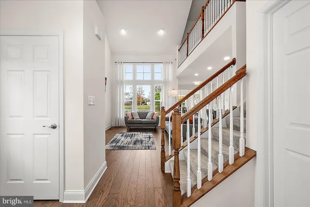 a kitchen with stainless steel appliances a refrigerator and cabinets