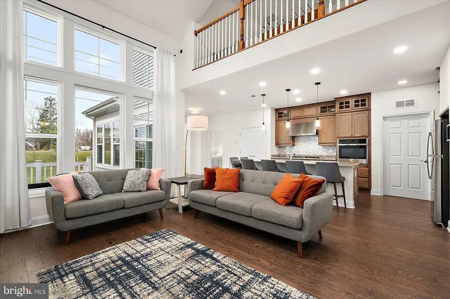 a bathroom with a sink toilet and a mirror