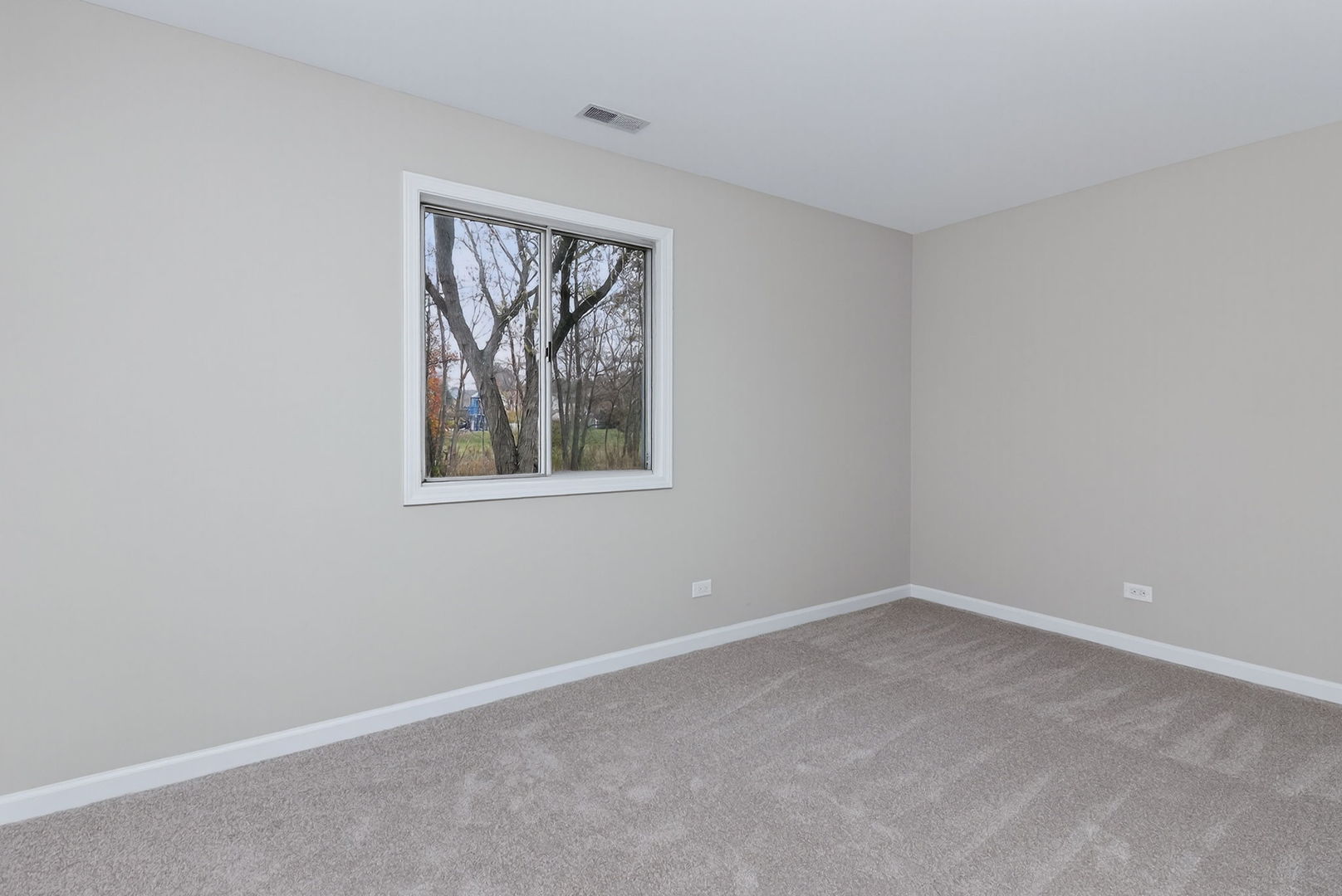 1314 Haverhill Circle Naperville, IL 60563 - Photo 11 of 15 an empty room with a window