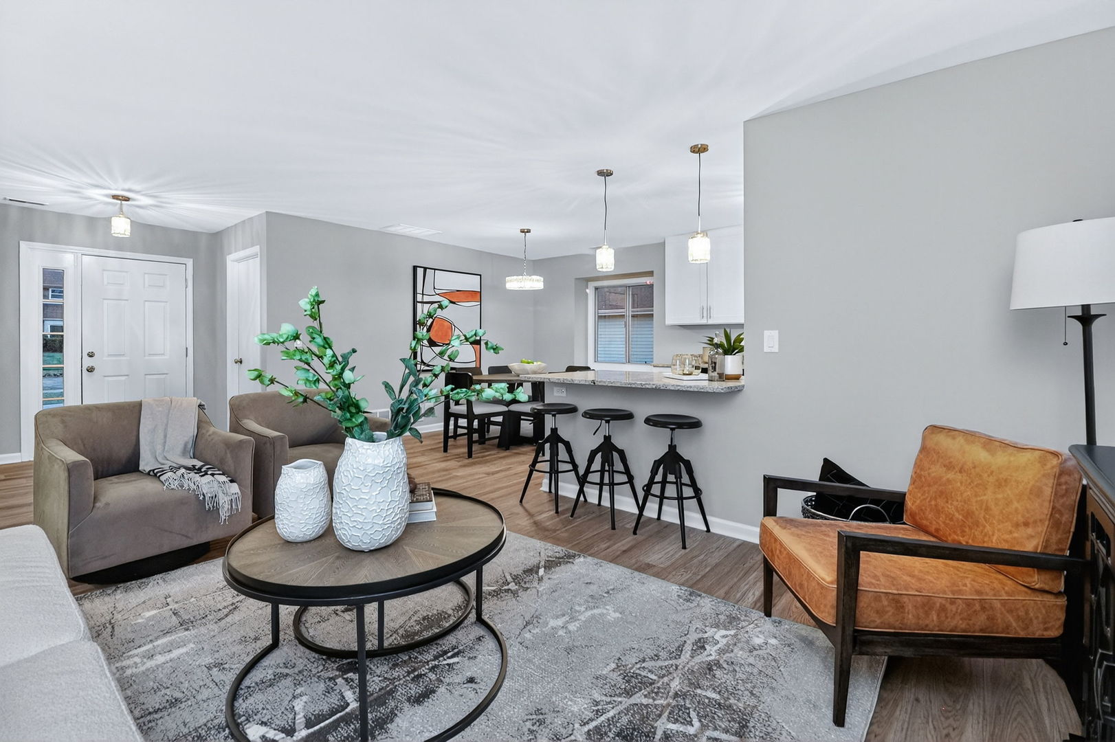 1314 Haverhill Circle Naperville, IL 60563 - Photo 3 of 15 a living room with furniture and a potted plant