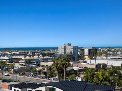 an aerial view of a residential apartment building with many windows