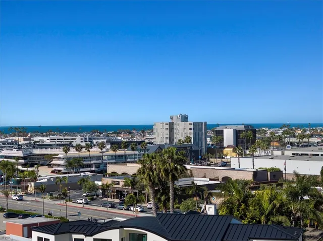 an aerial view of a residential apartment building with many windows