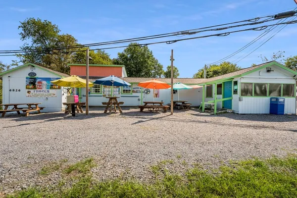 a front view of a house with a garage