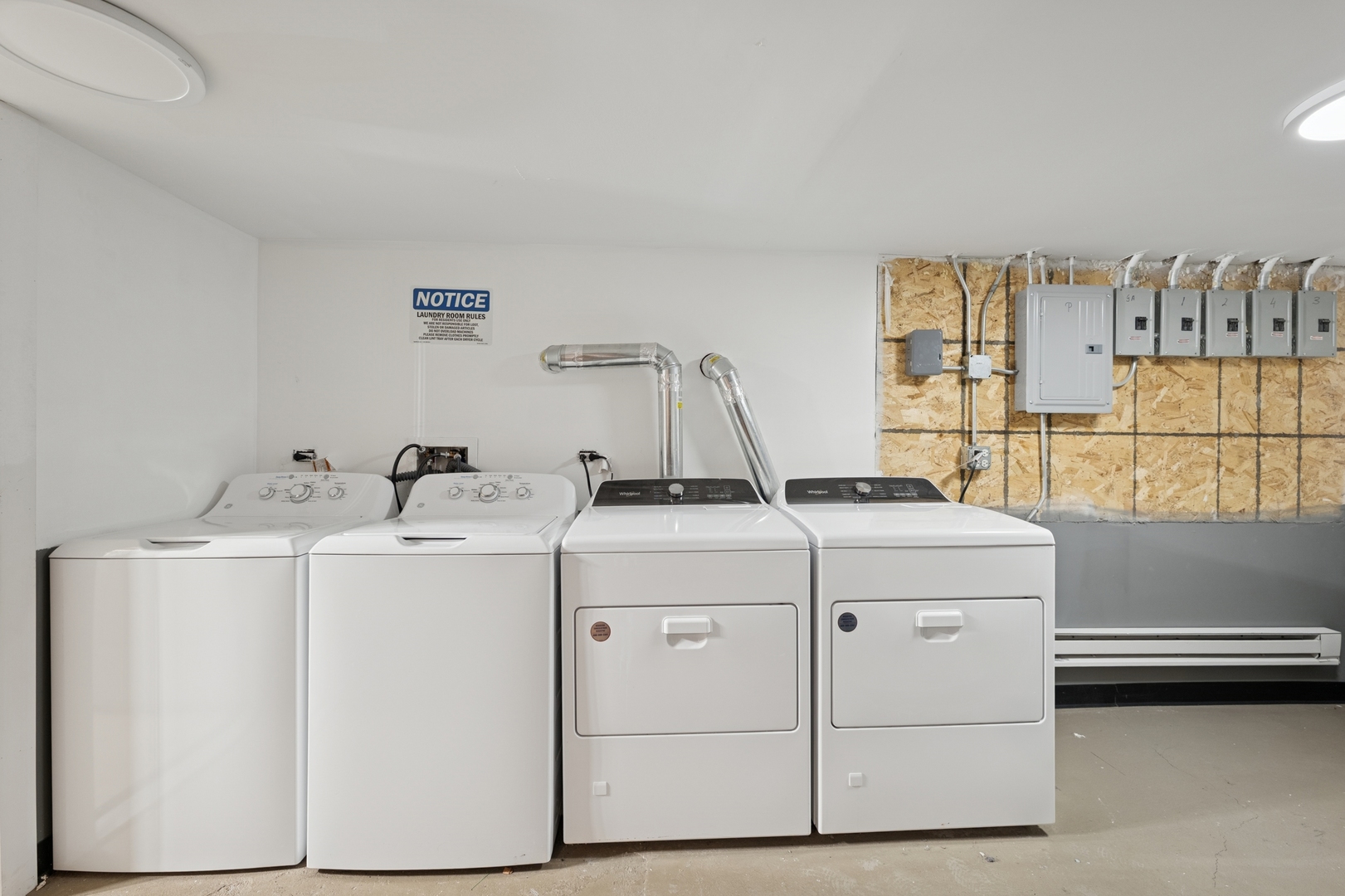 9635 South Forest Avenue, Unit 2 Chicago, IL 60628 - Photo 7 of 12 a utility room with dryer and washer