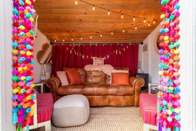 a view of a dinning table and chairs in the room