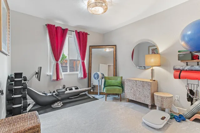 a room with furniture and a window