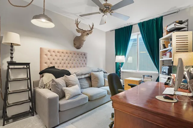 a living room with furniture and a window