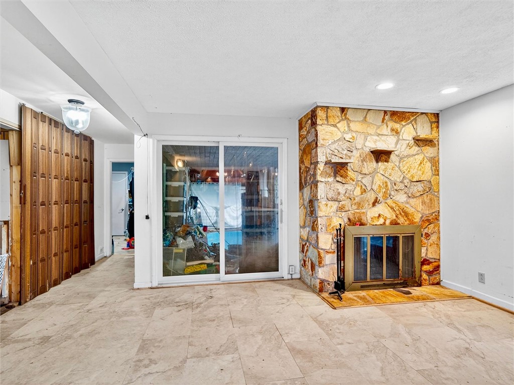 1855 North Union Street Parma, NY 14559 - Photo 13 of 49 Living room with double sided fireplace