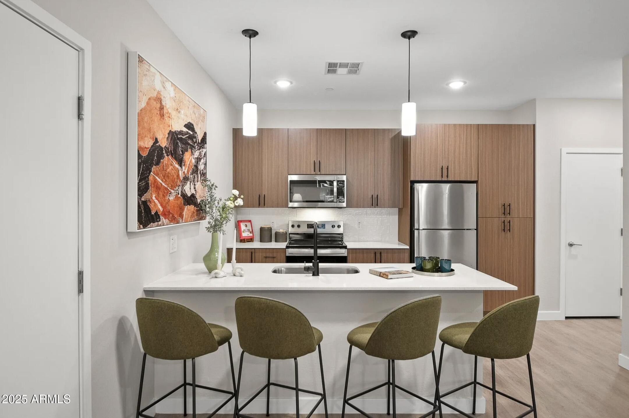 17445 West Lower Buckeye Road, Unit A2 Goodyear, AZ 85338 - Photo 15 of 35 Kitchen