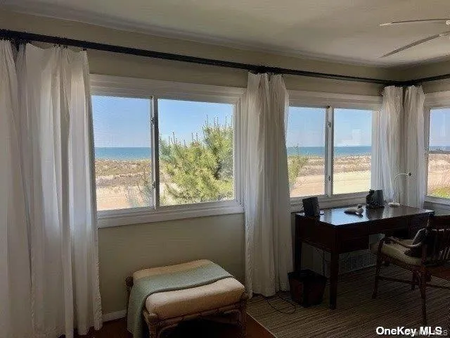 a room with furniture and a window